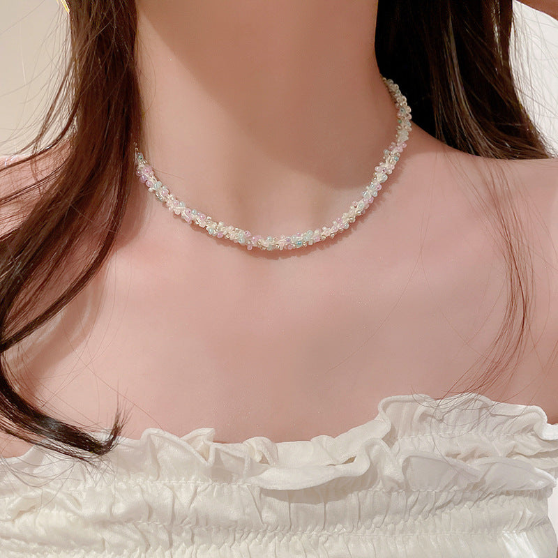 Collana in acciaio con perline di riso