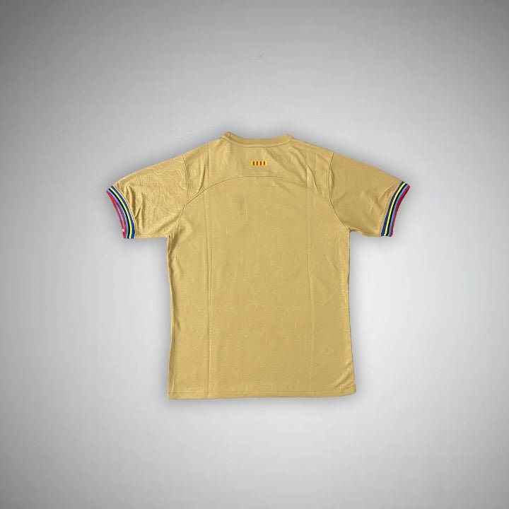 22-23-fc-barcelona-gold-shirt-1