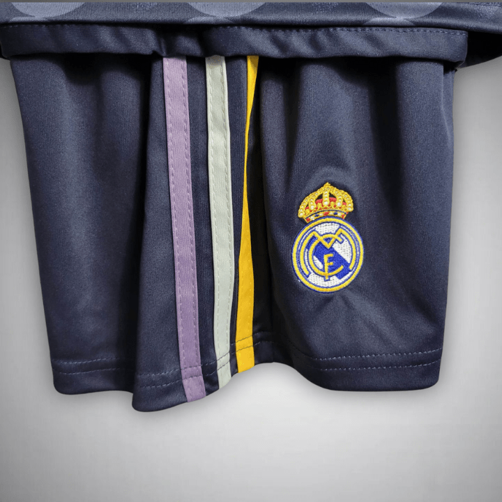 2023-24-real-madrid-kids-football-kit-away-1