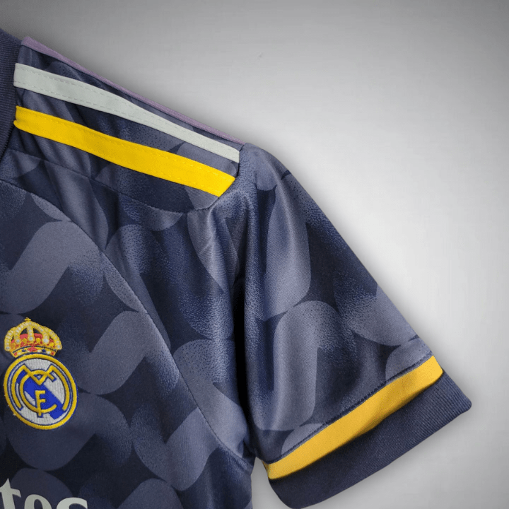 2023-24-real-madrid-kids-football-kit-away-1