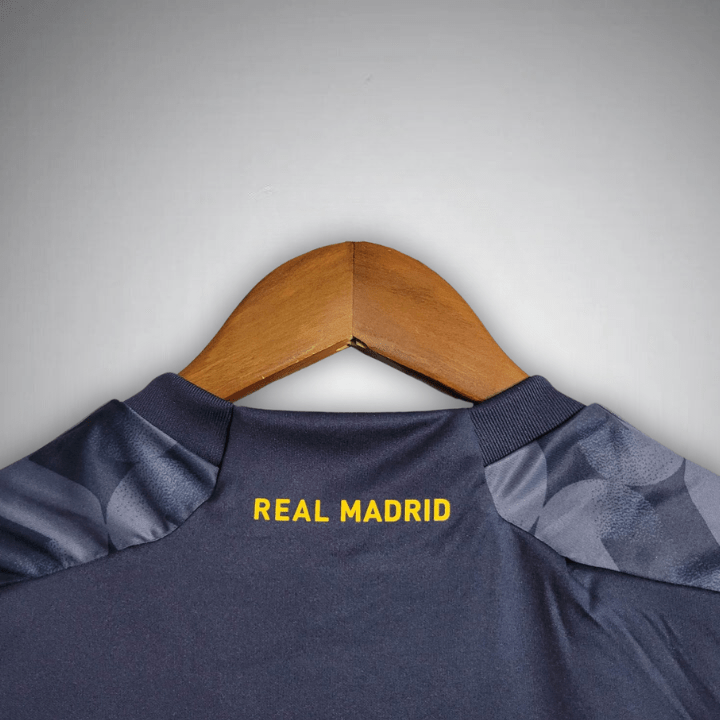 2023-24-real-madrid-kids-football-kit-away-1