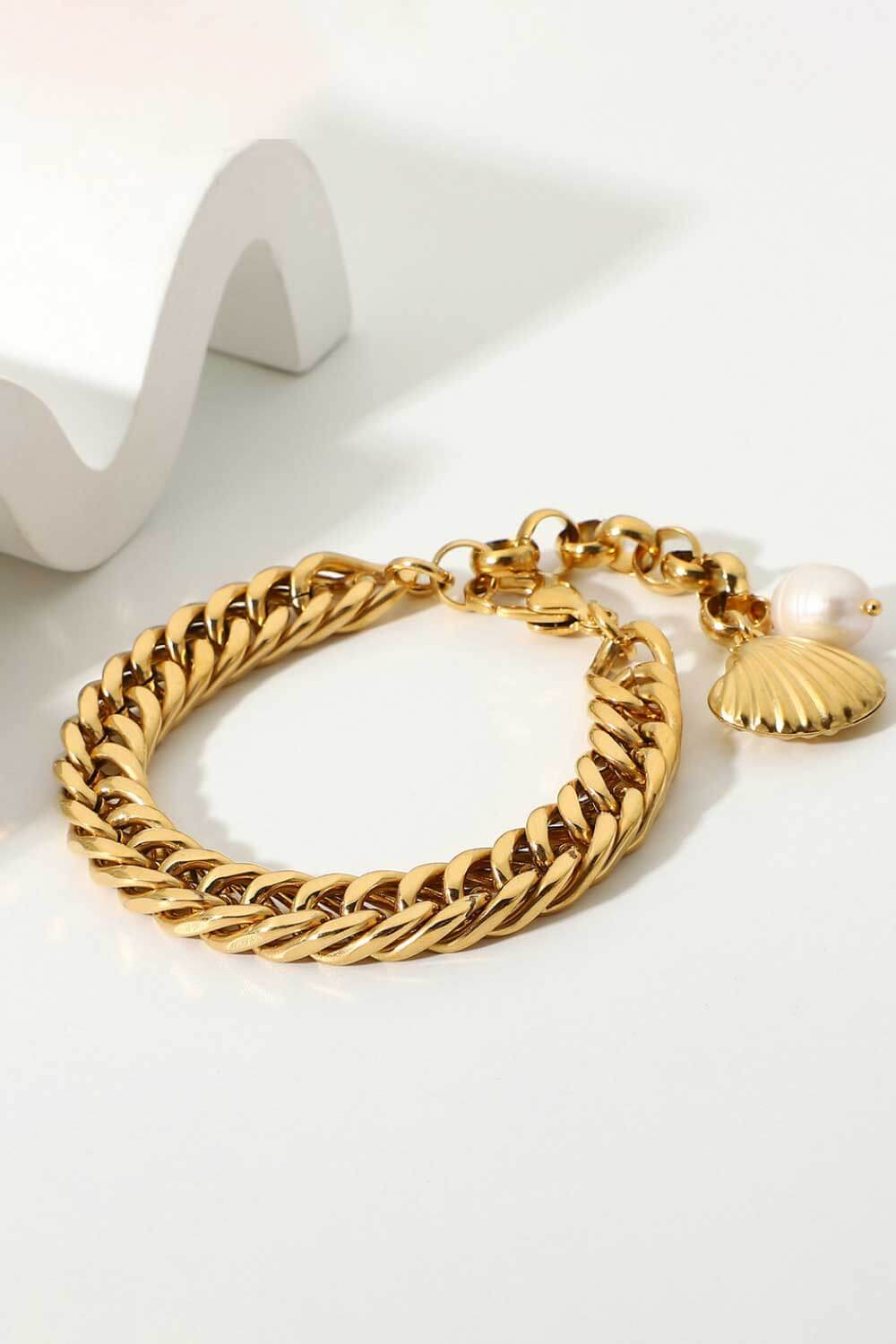 Bracciale a catena curb in oro