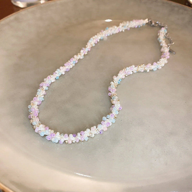 Collana in acciaio con perline di riso