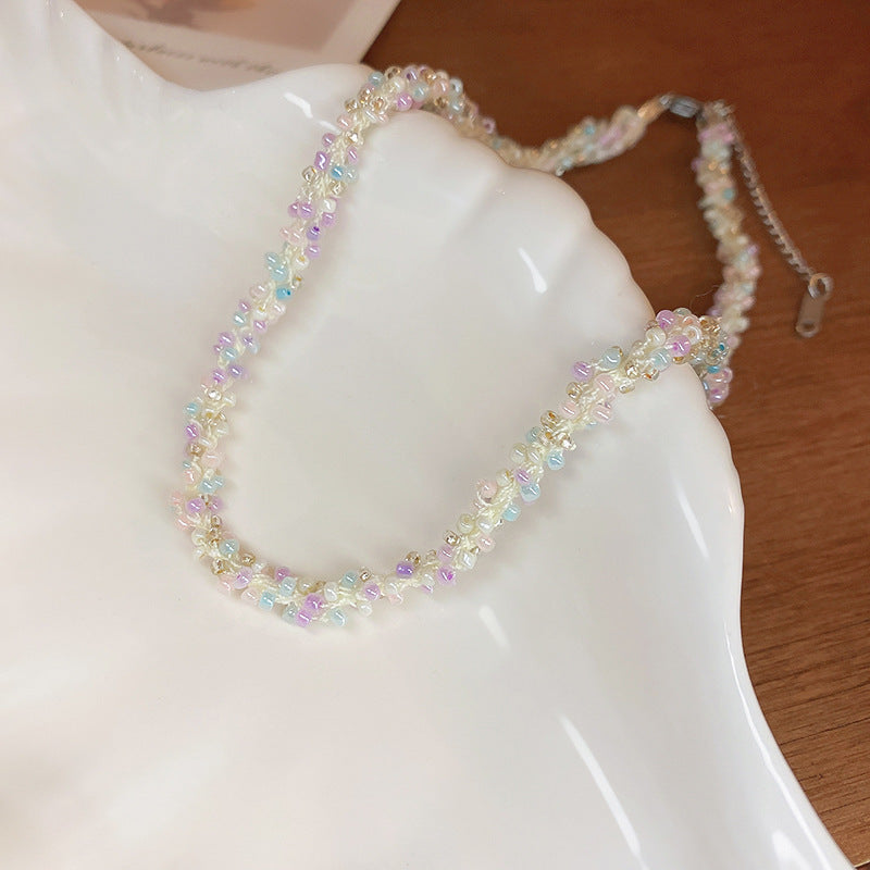Collana in acciaio con perline di riso
