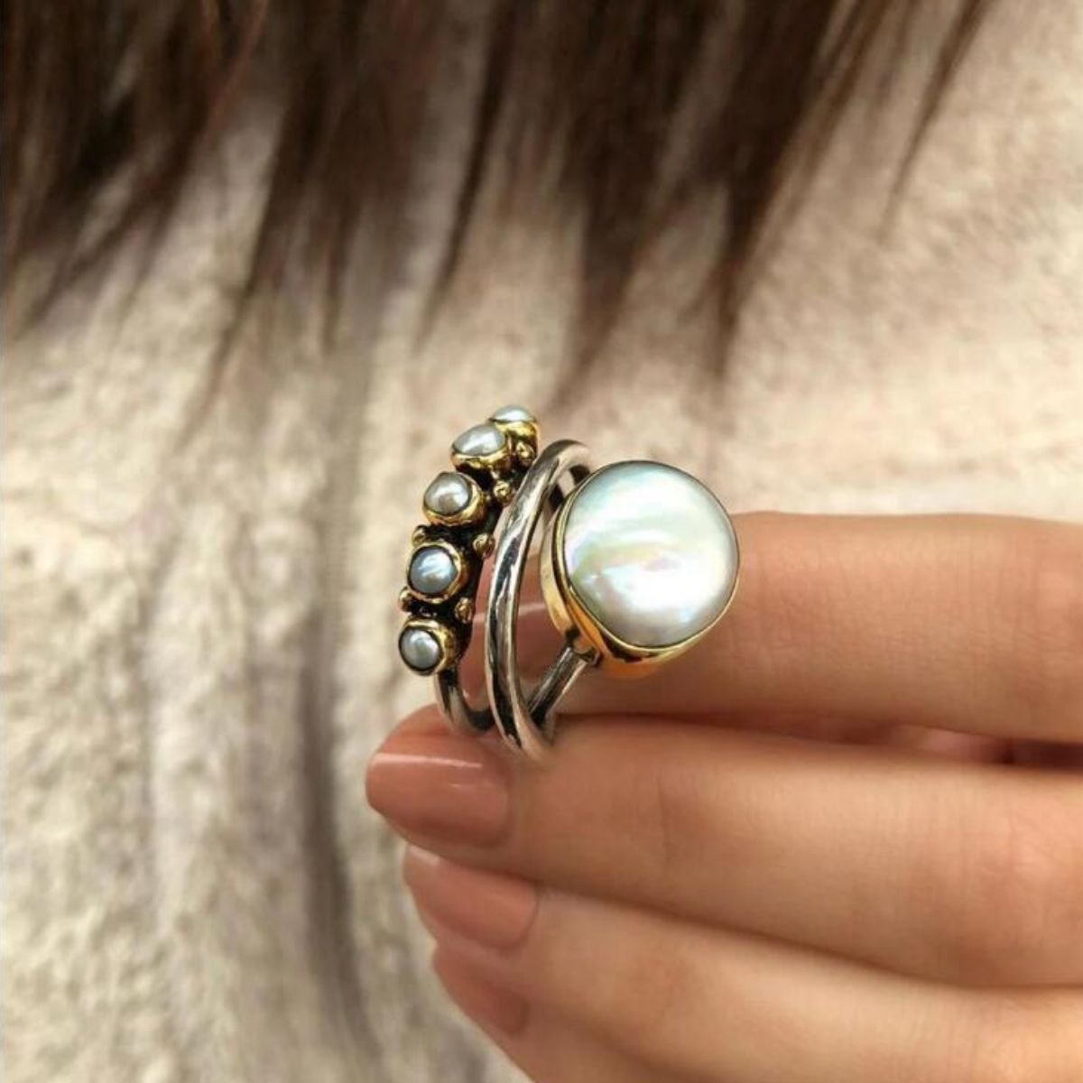 Anello aperto a triplo strato