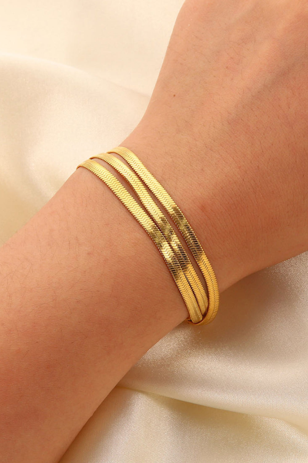 Brazalete de cadena de triple serpiente