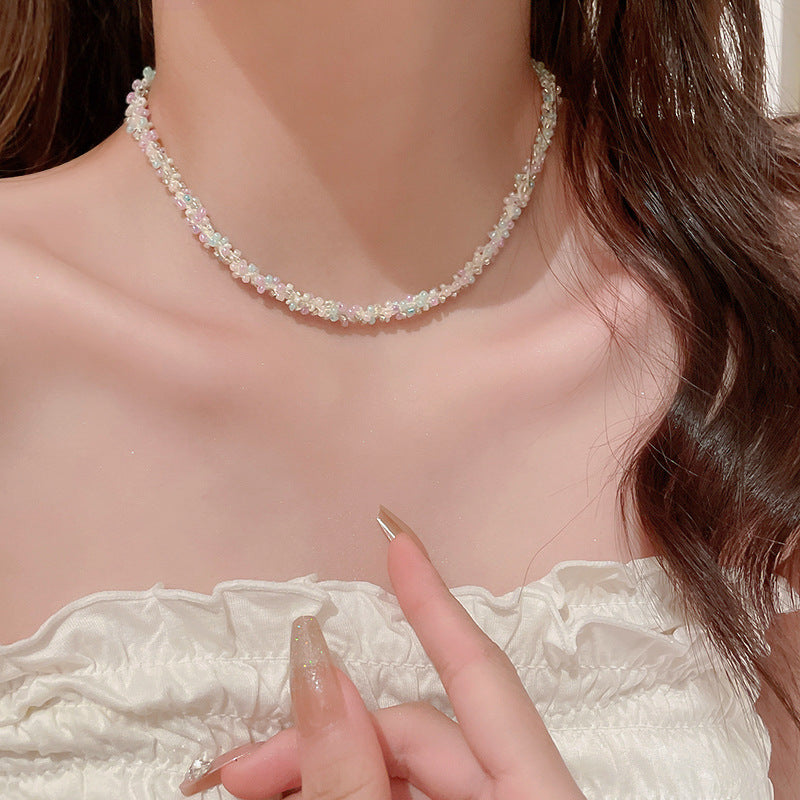 Collana in acciaio con perline di riso