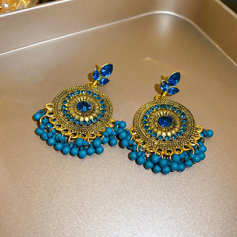 Perlebesatte rhinestone dangleøreringe