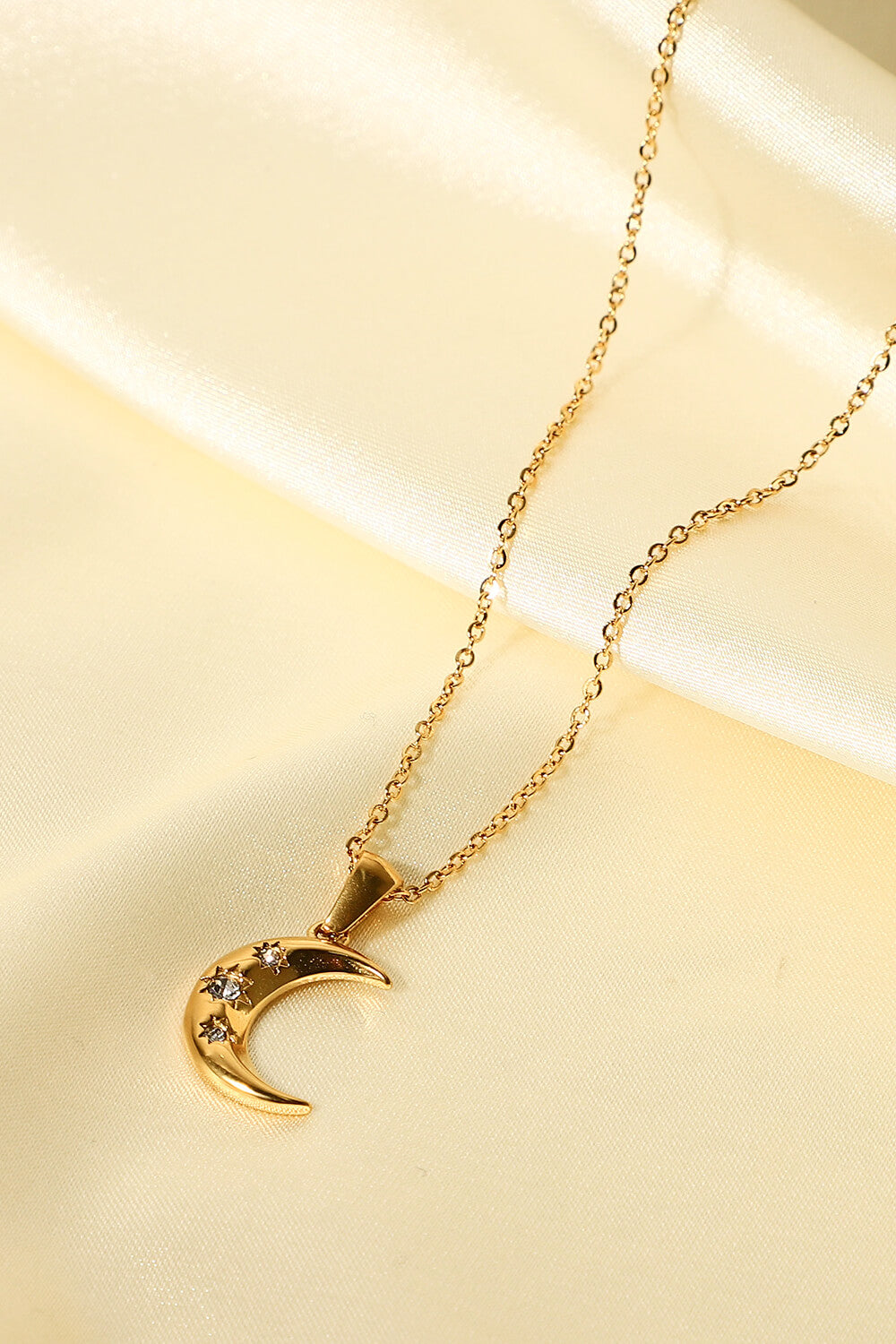 Collana con ciondolo luna d'oro e zircone
