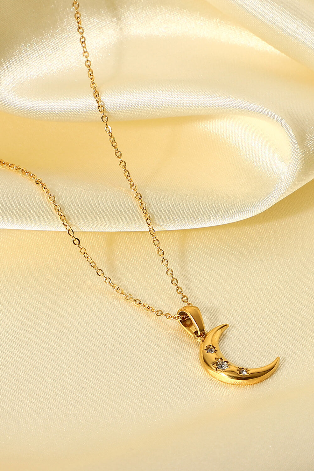Collana con ciondolo luna d'oro e zircone