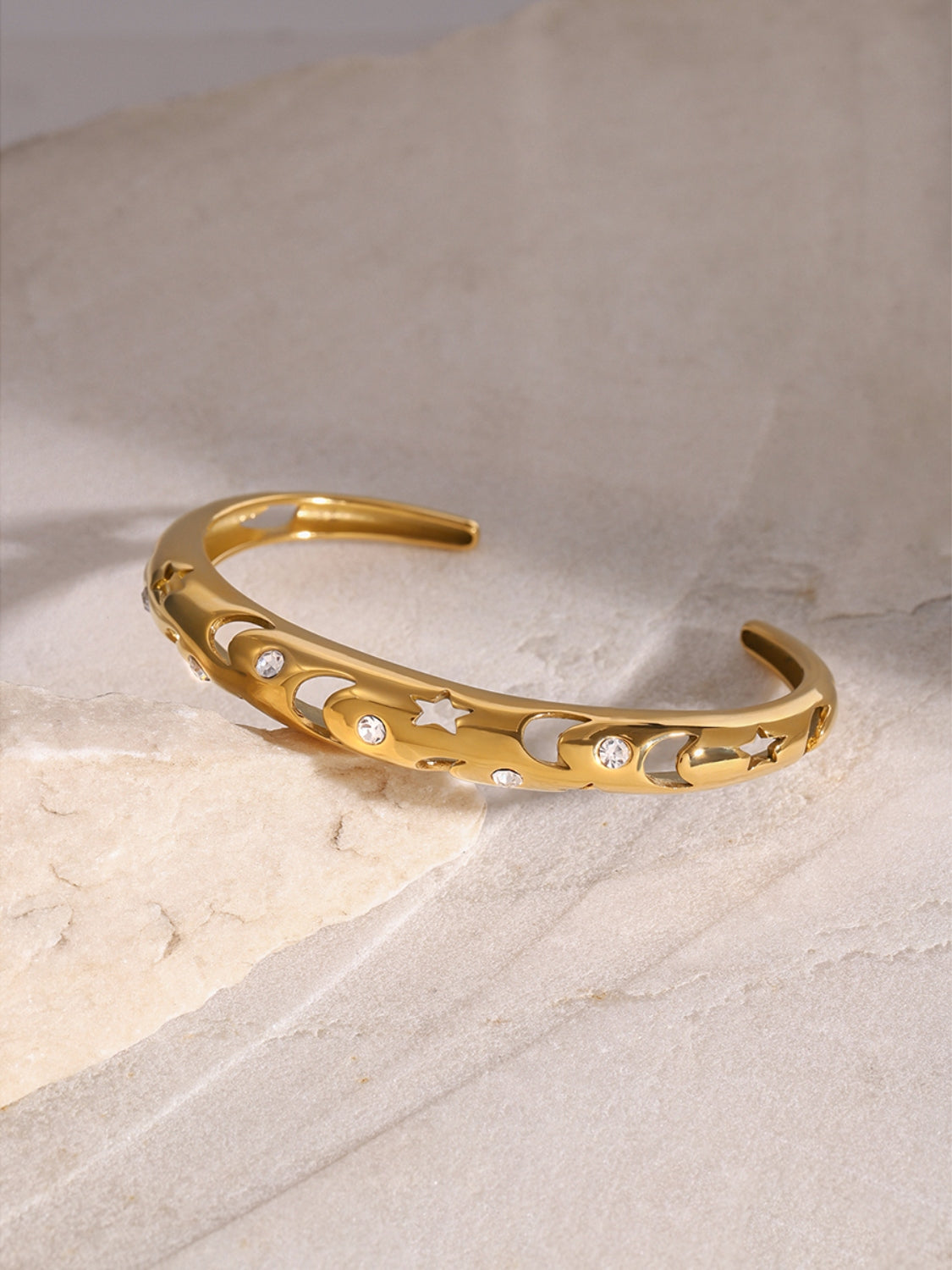 Polsino in acciaio con ritagli e strass