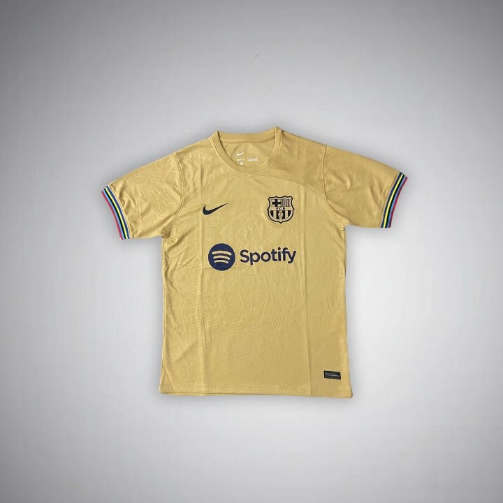 22-23-fc-barcelona-gold-shirt-1