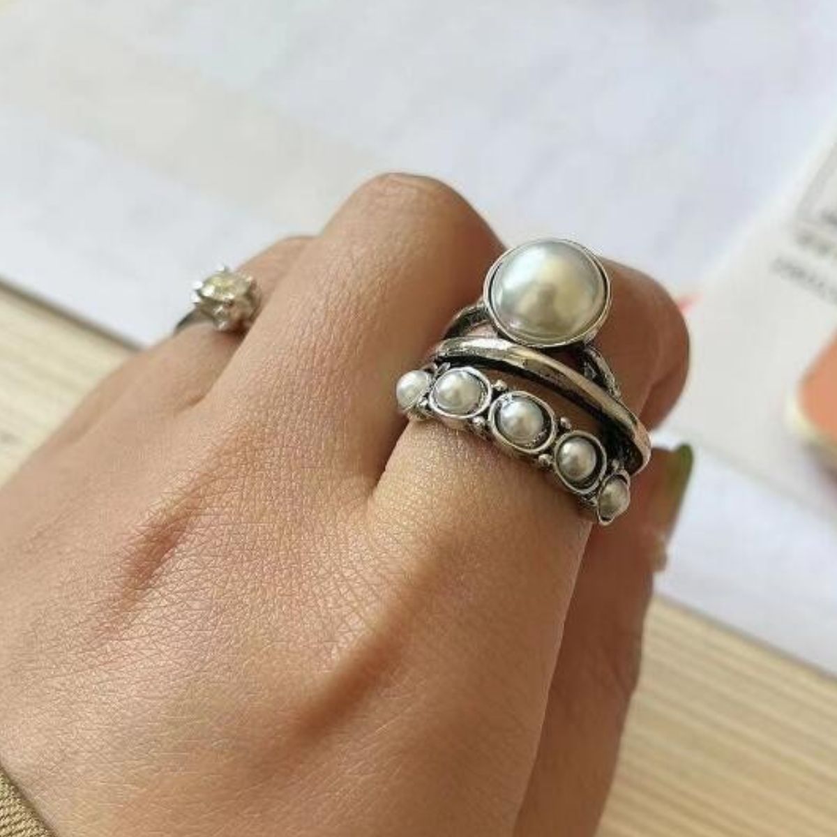 Anello aperto a triplo strato