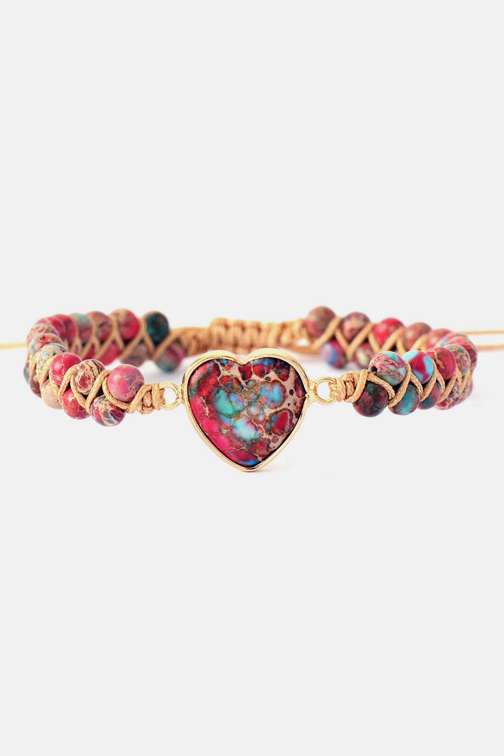 Anello con pietra a forma di cuore e perline
