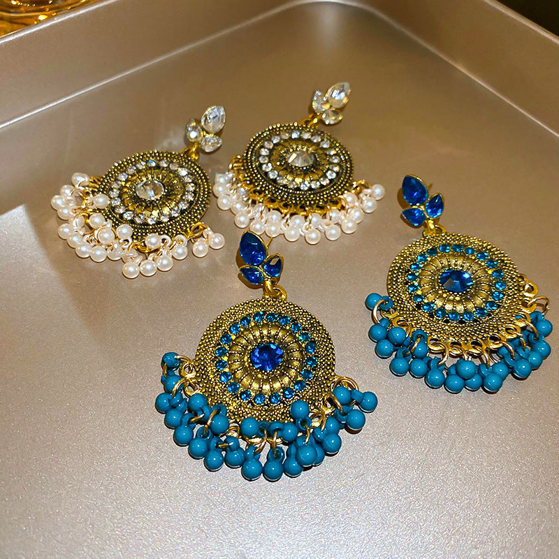 Perlebesatte rhinestone dangleøreringe