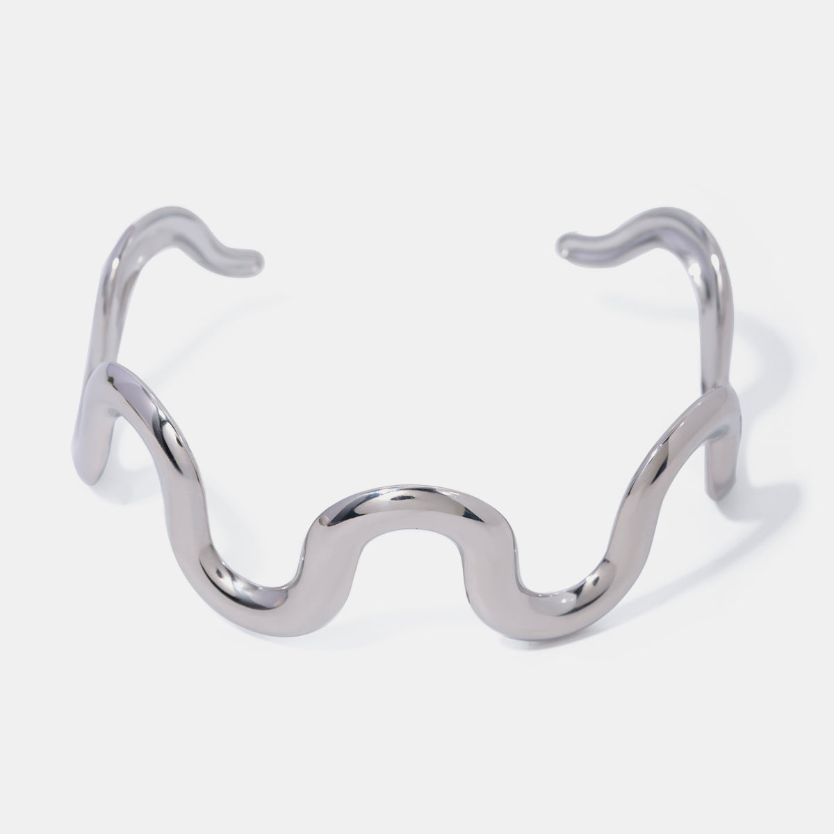 Bracciale rigido ondulato in acciaio