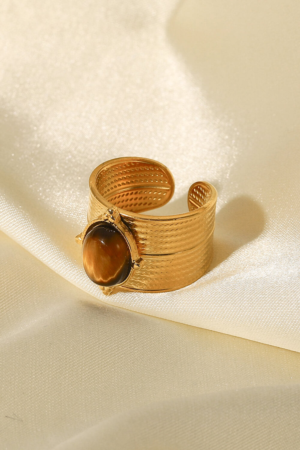 Anello largo aperto in oro