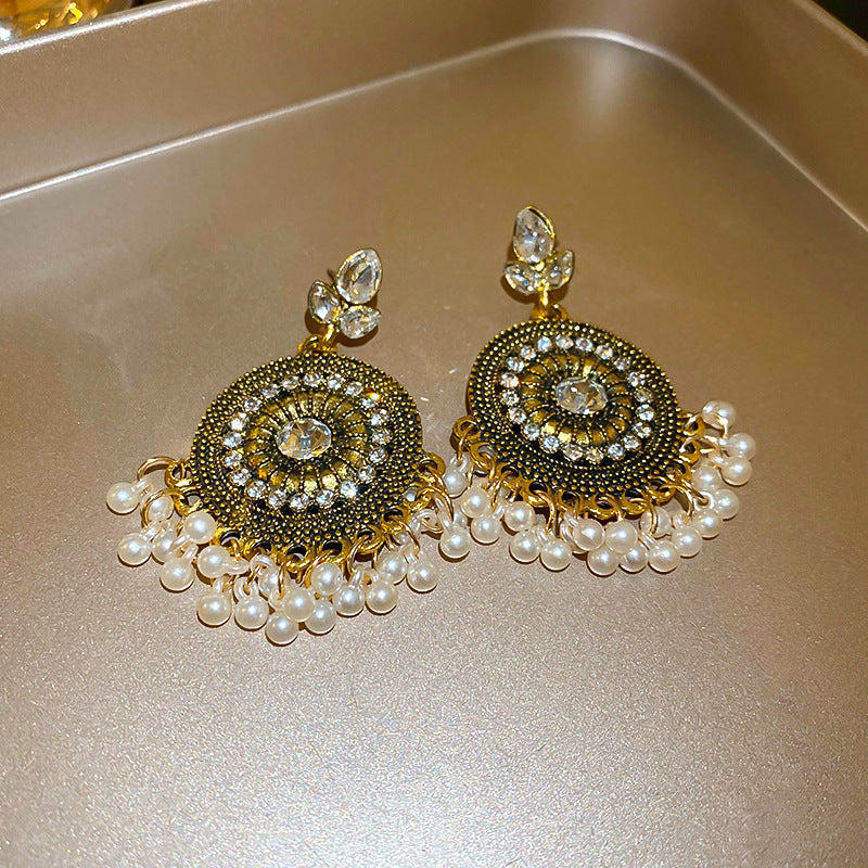 Perlebesatte rhinestone dangleøreringe