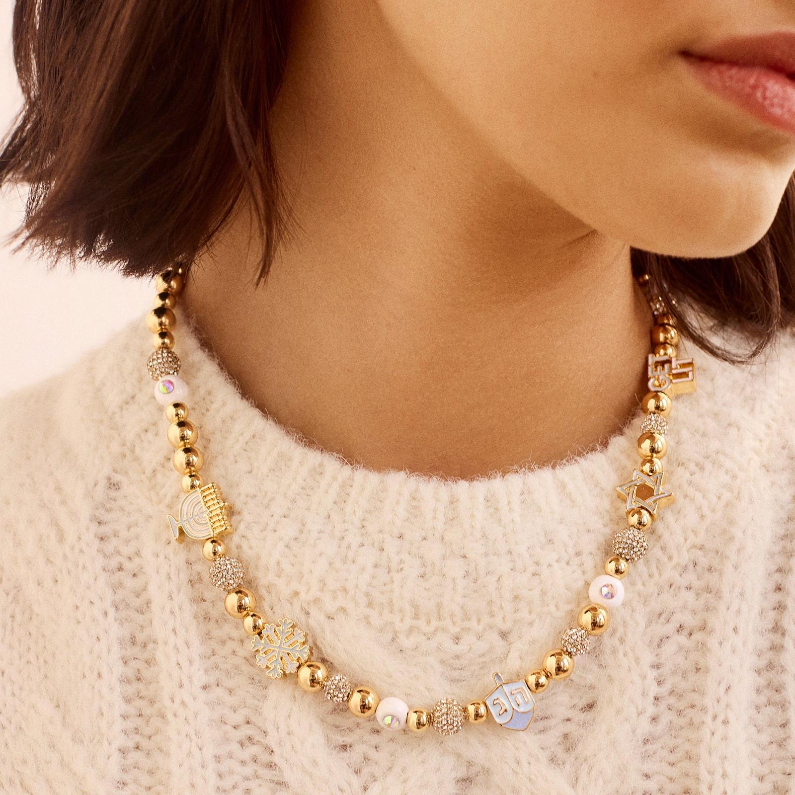 Catena di strass con perline dorate