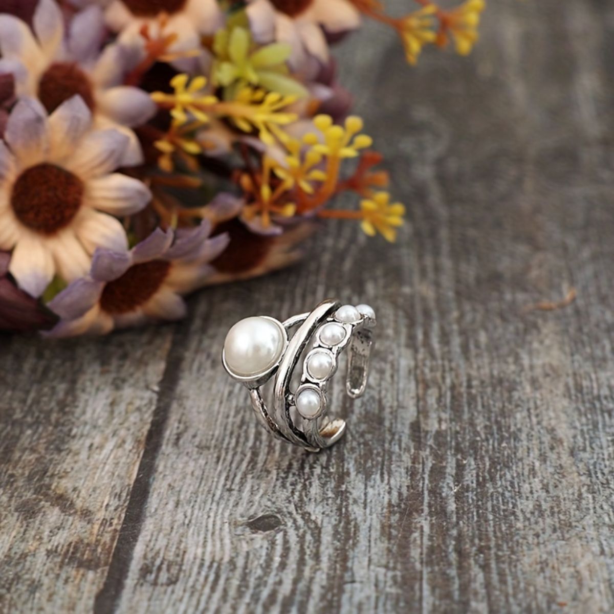 Anello aperto a triplo strato